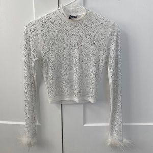 White sparkly top with feather wrists
